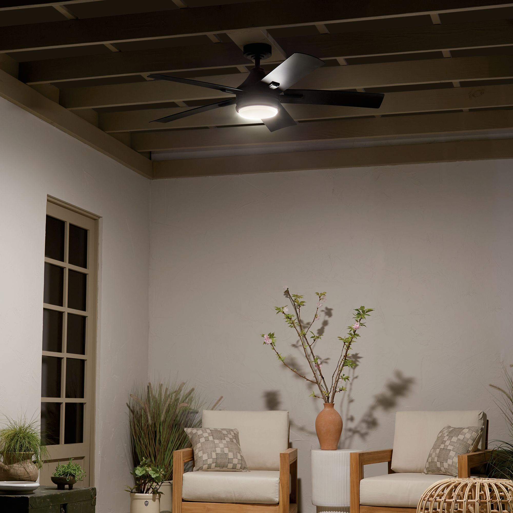 52" Kichler Tide Weather+ Black LED Wet Ceiling Fan with Remote in scene