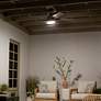 52" Kichler Tide Weather+ Olde Bronze LED Wet Remote Ceiling Fan in scene