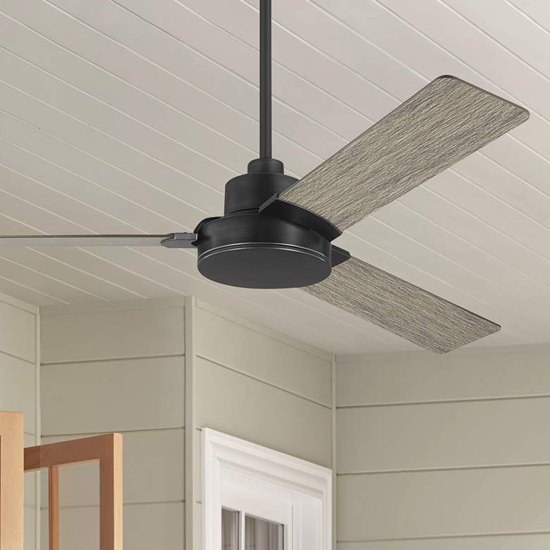 Image 1 52 inch Monte Carlo Jovie Pewter Damp Rated Ceiling Fan with Wall Control