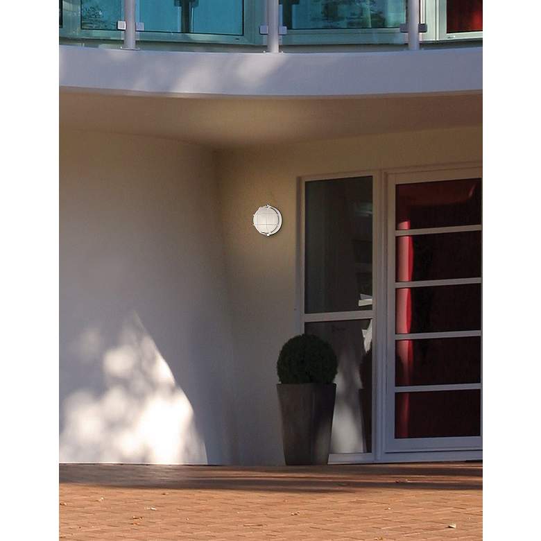 Image 1 Nauticus Collection 7" Round White Outdoor Wall Light in scene