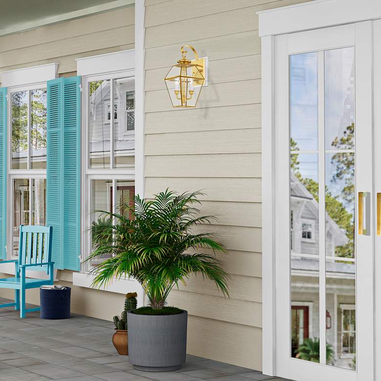 Image 1 Livex Westover 16 1/2" 2-Light Polished Brass Outdoor Wall Light in scene