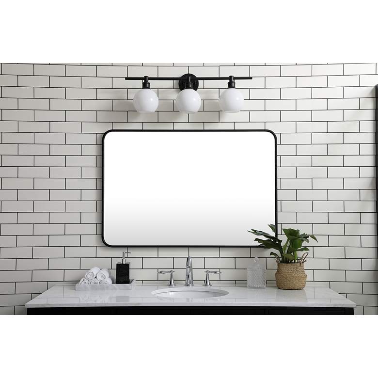 Image 1 27-in W x 40-in H Soft Corner Metal Rectangular Wall Mirror in Black in scene