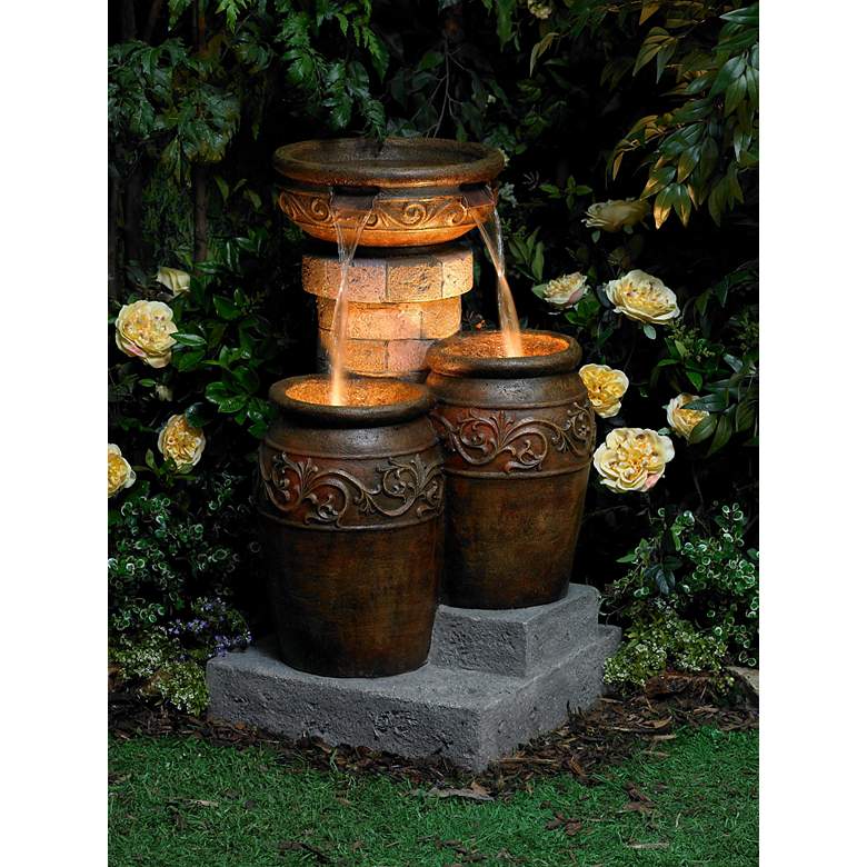 Image 1 Tuscan Faux Stone 31 1/2 inch High LED Floor Patio Fountain in scene
