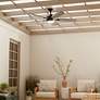 56" Kichler Tranquil Olde Bronze LED Damp Ceiling Fan with Remote in scene