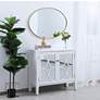 1_Decker Brass Metal 34" x 24" Oval Vanity Wall Mirror in scene