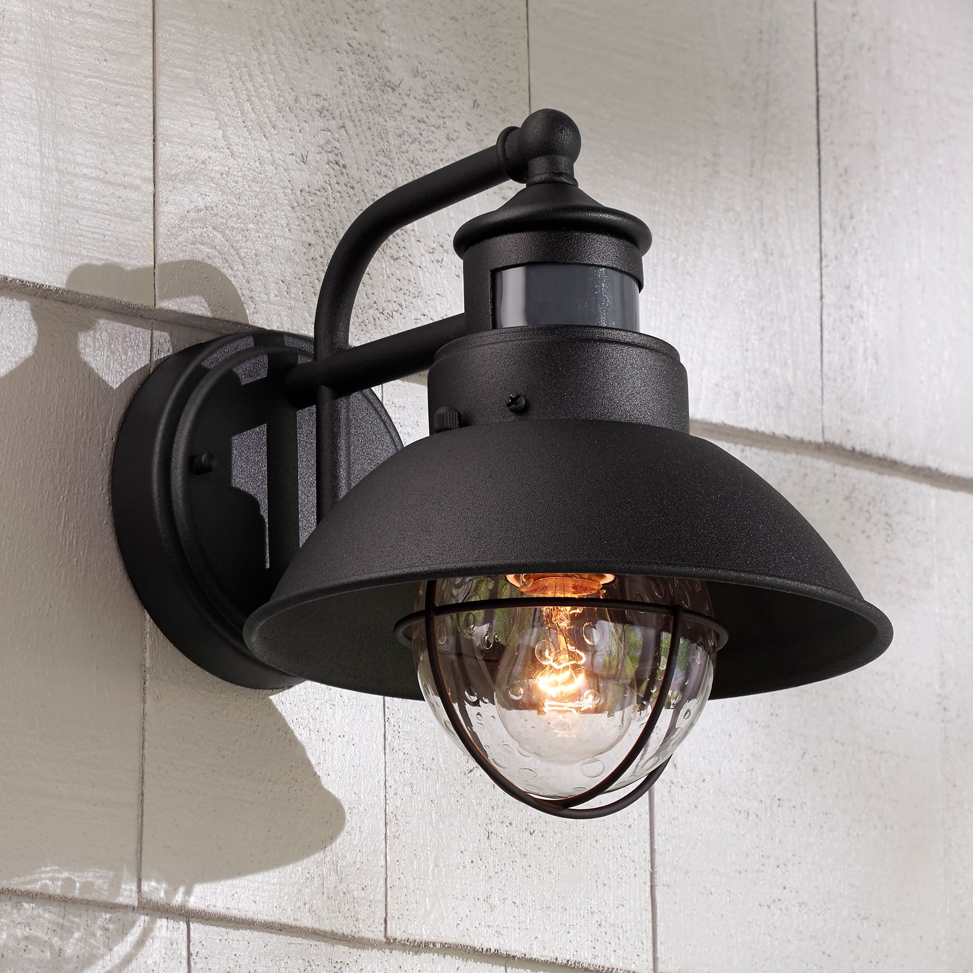 Image 1 John Timberland Oberlin 9" Black Dusk to Dawn Motion Sensor Barn Light in scene