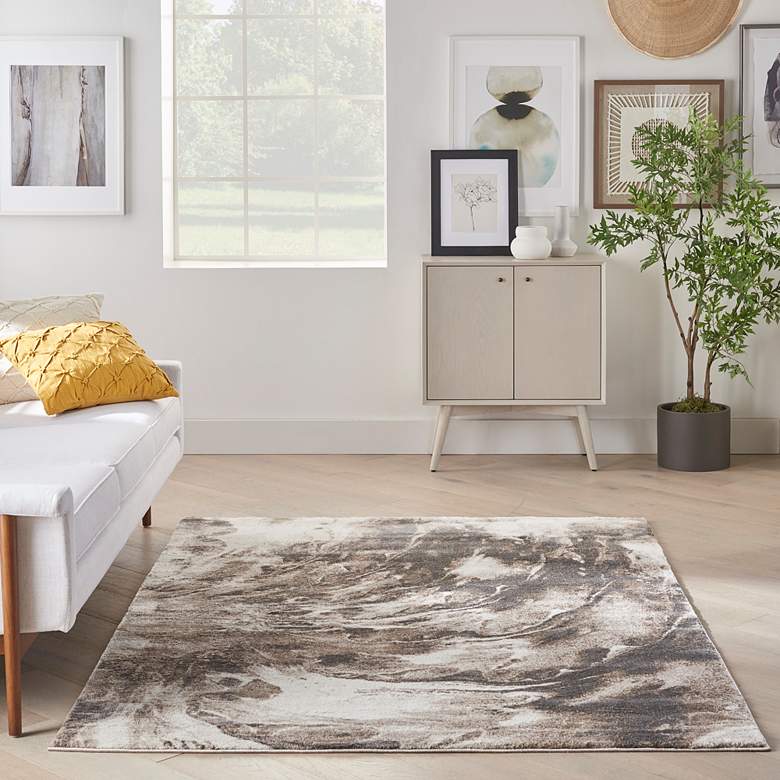 Image 1 American Manor 5'3" x 7'3" Iv/Mocha Abstract Indoor Rug in scene