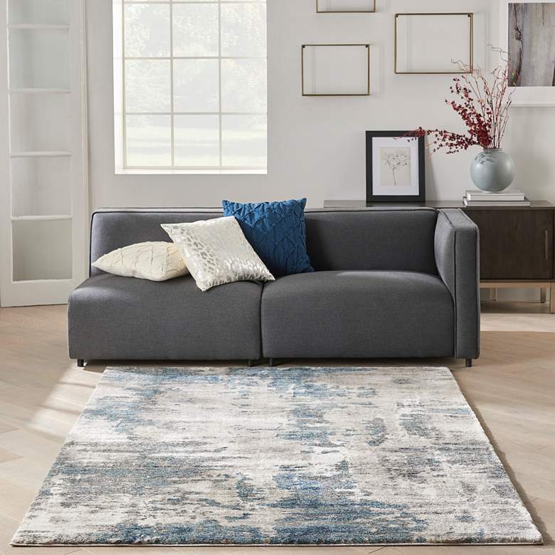 Image 1 American Manor 5'3" x 7'3" Ivory Blue Abstract Indoor Rug in scene