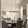 1_Kichler Vetivene 46 1/2" Wide Natural Brass 8-Light Linear Chandelier in scene