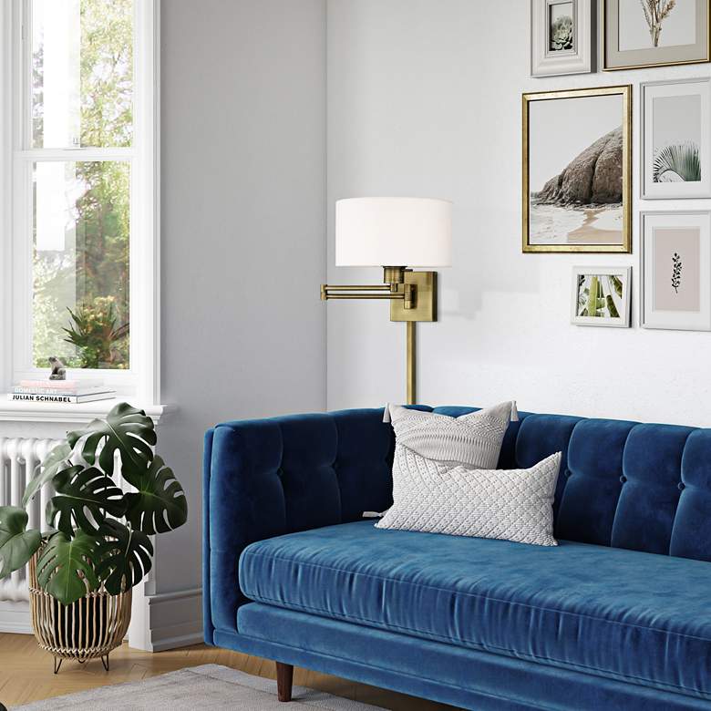 Image 1 Beauchamp Antique Brass Swing Arm Wall Lamp in scene