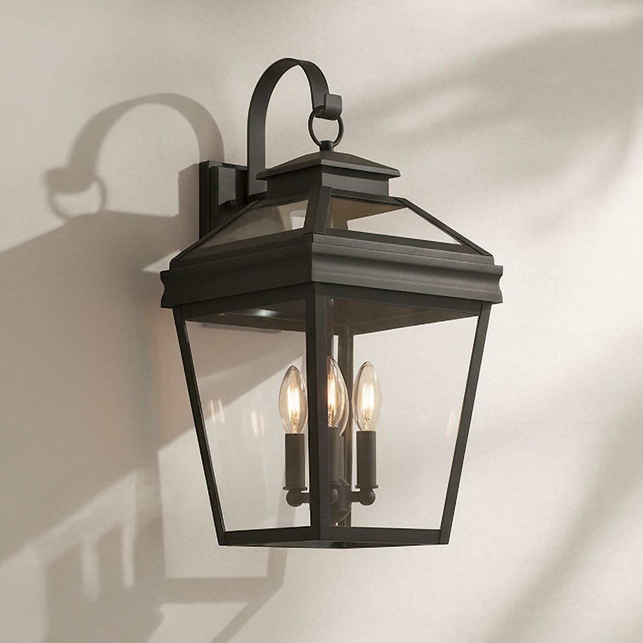 John Timberland Stratton Street 22" Black Outdoor Lantern Wall Light in scene