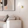 1_Kennedy Brushed Champagne Bronze Swing Arm Wall Lamp in scene