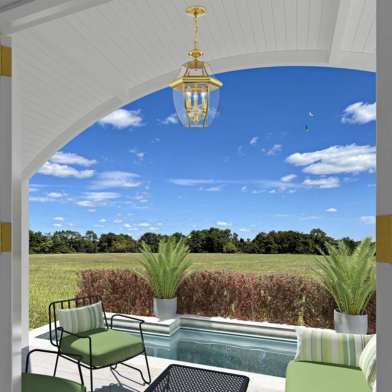 Image 1 Monterey 21"H Polished Brass 3-Light Outdoor Hanging Light in scene