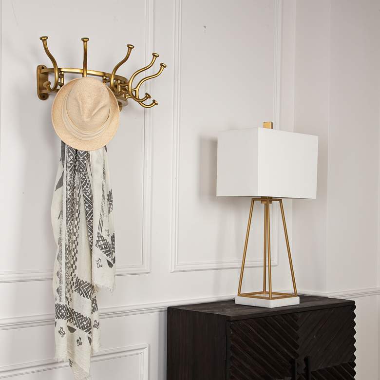 Image 1 Starling 25" Wide Antique Brass Metal Wall-Mount Coat Rack in scene