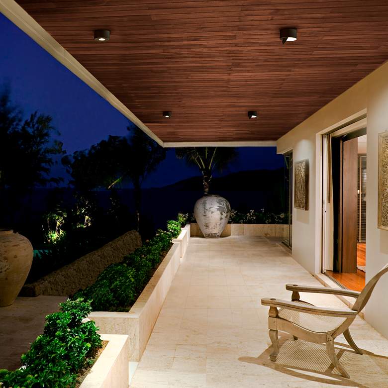 Image 1 dweLED Peek 4 3/4" Wide Black LED Outdoor Ceiling Light in scene