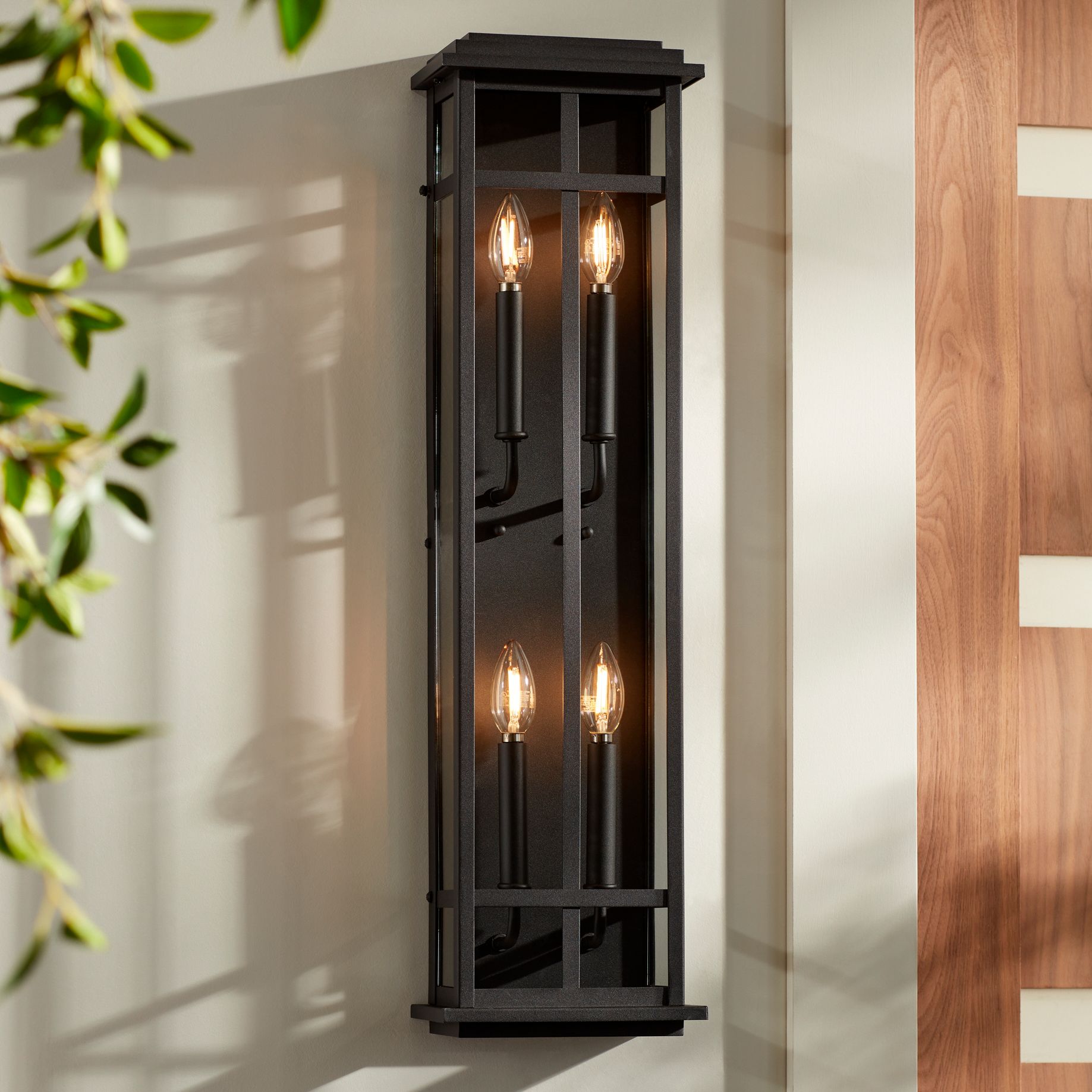 Image 1 Possini Euro Metrix 30" Black 4-Light Rectangular Outdoor Wall Light in scene