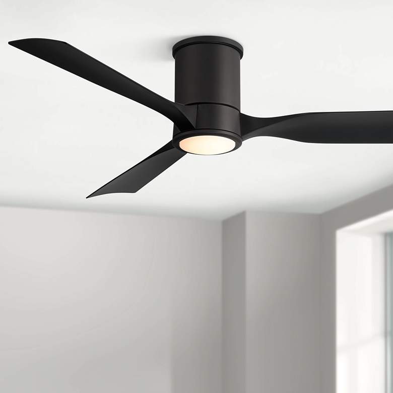 Image 1 56" Casa Vieja Keel Matte Black LED Damp Remote Hugger Ceiling Fan in scene