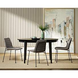 Image1 of Atle 53 1/2" Wide Painted Matte Black Wood Oval Dining Table in scene