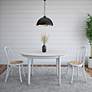 Atle 53 1/2" Wide Painted Matte White Wood Oval Dining Table in scene