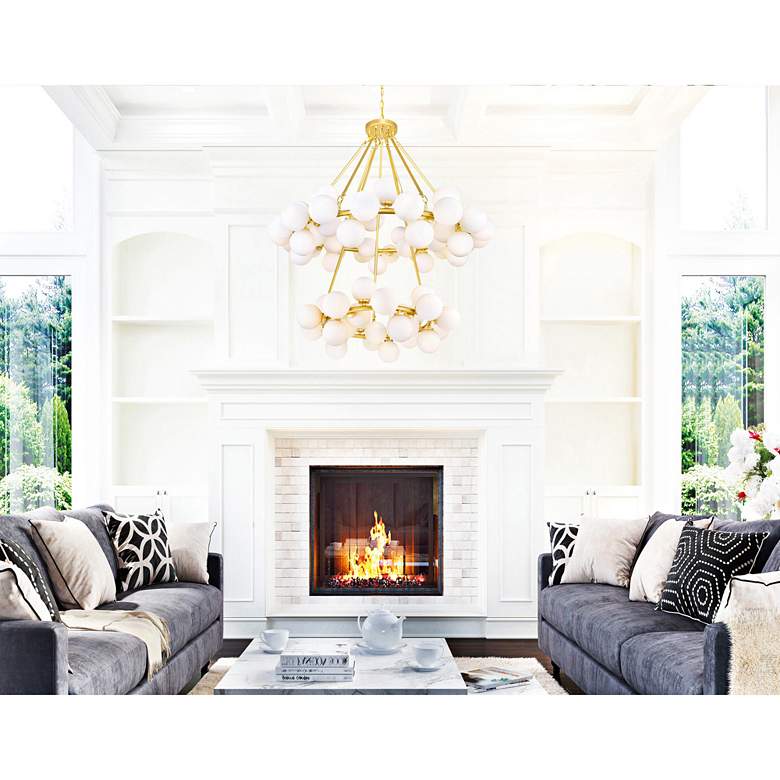 Image 1 Arya 39" Wide Satin Gold 70-Light Globe Chandelier in scene