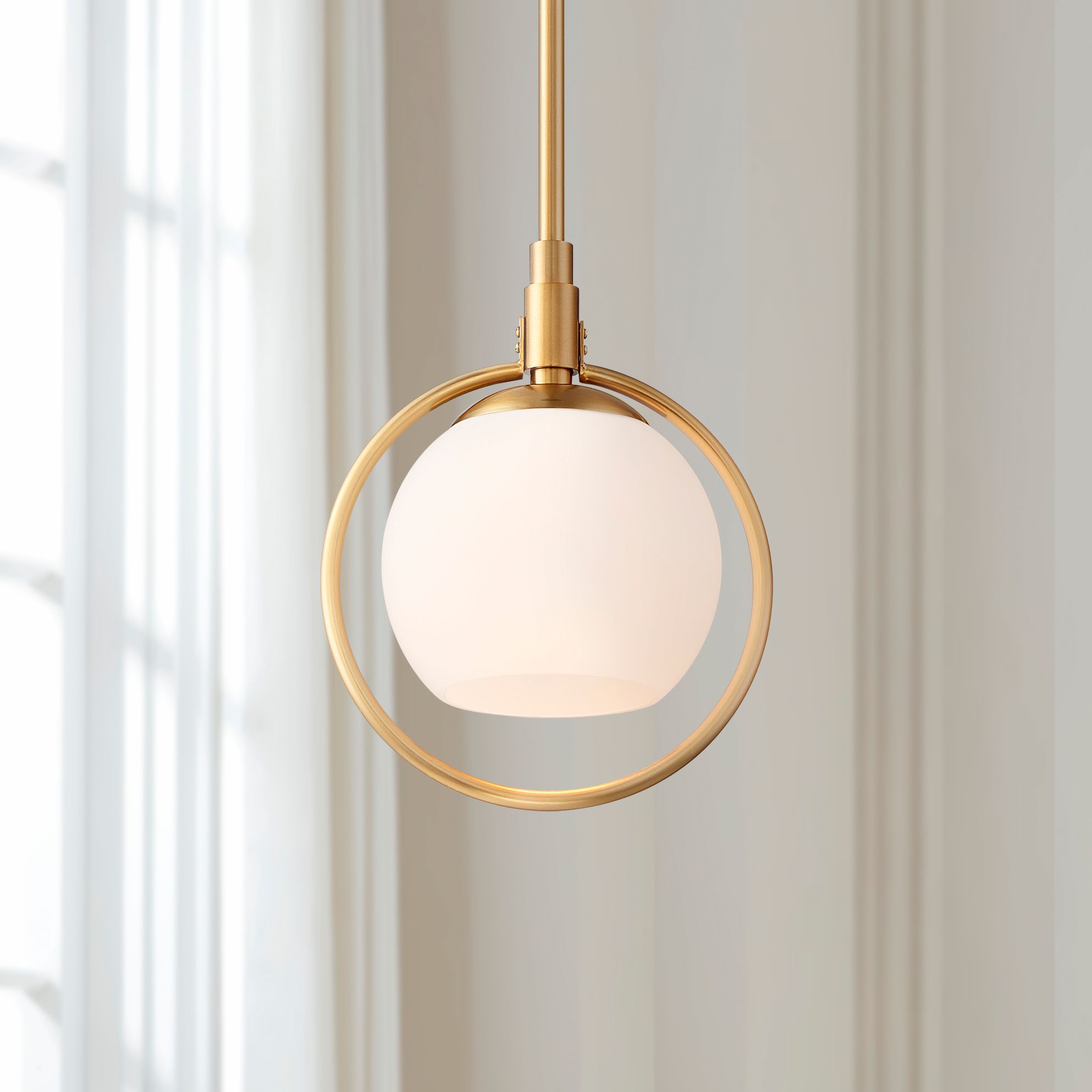 Watch A Video About the Possini Euro Carlyn Gold and Glass Orb Mini Pendant Light