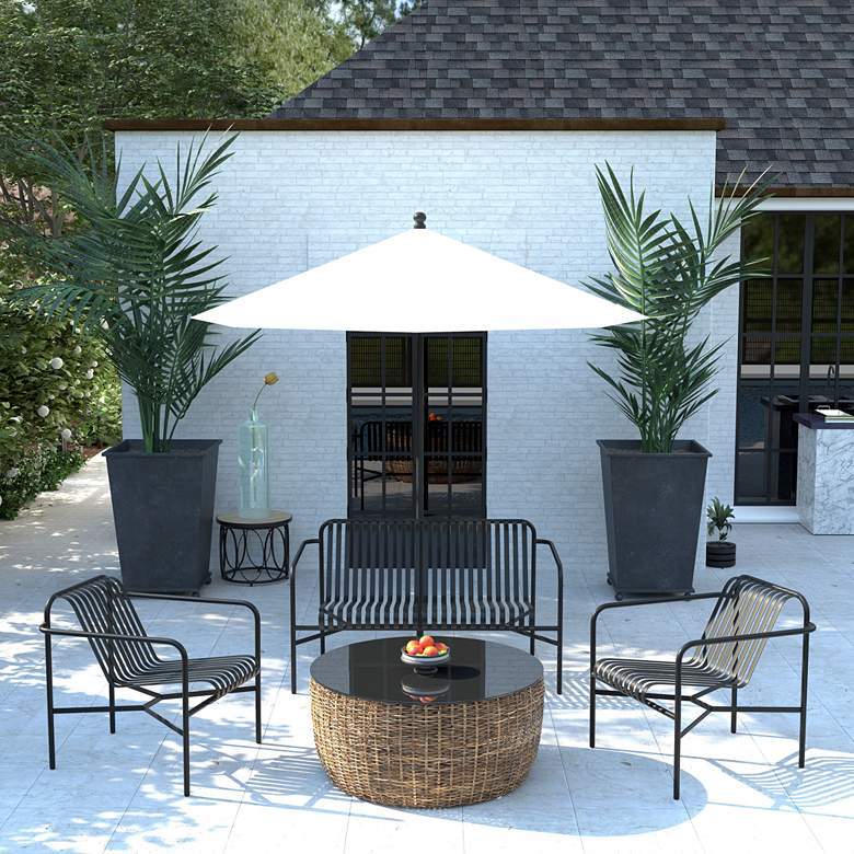 Image 1 Enid Black Metal Outdoor Lounge Chair in scene