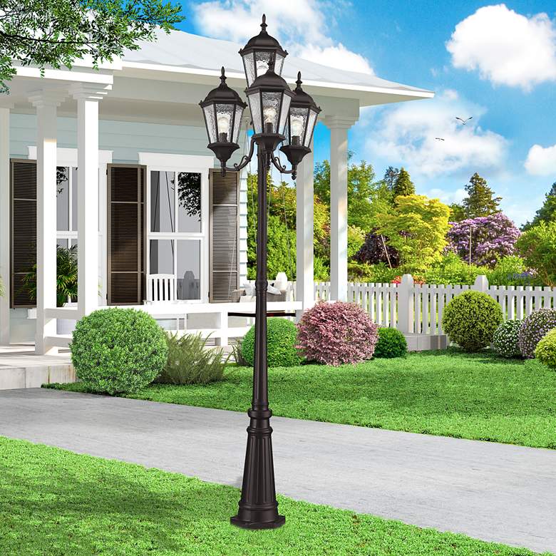 Image 1 Hamilton 95" High Bronze 4-Head Post Light with Base in scene
