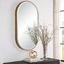 1_Lago Antiqued Golden Bronze 21 1/4" x 40" Oval Wall Mirror in scene