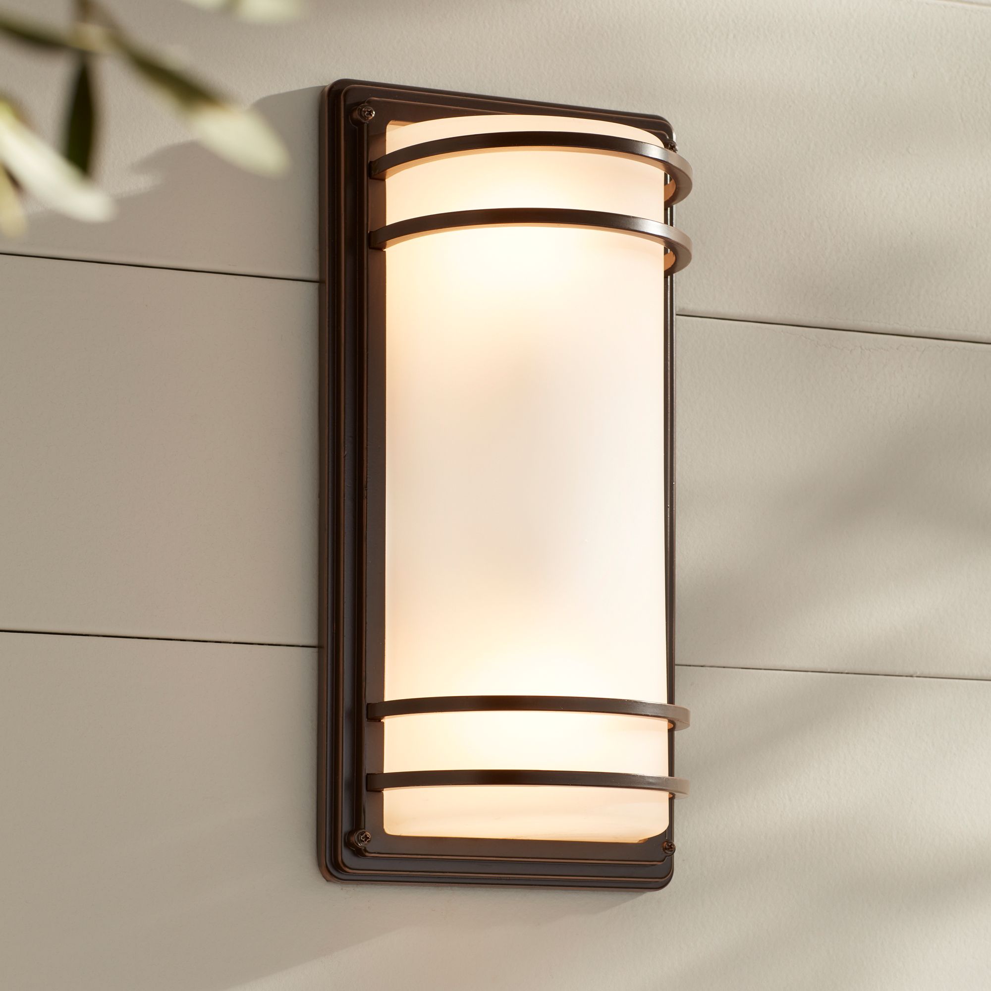 Image 1 John Timberland Habitat 16" Bronze and Opal Glass Outdoor Wall Light in scene