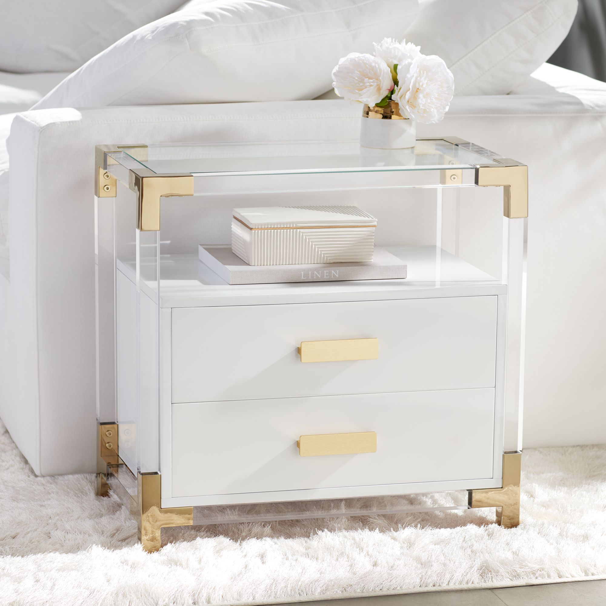 White nightstand with store gold accents