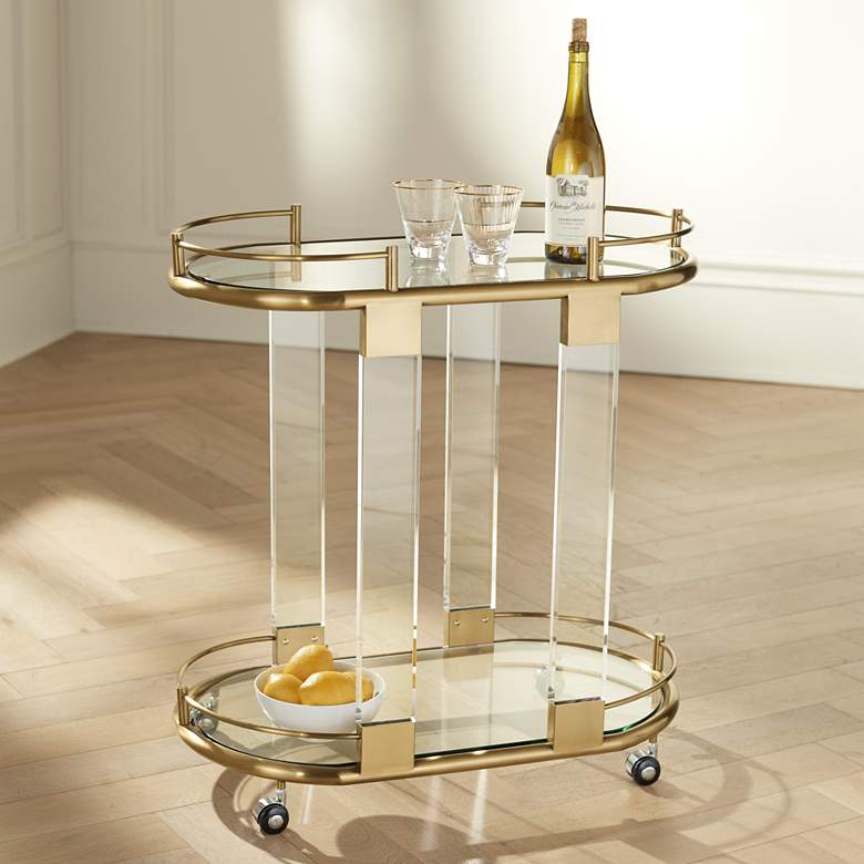 Adaline 29 1/2&quot; Wide Clear Acrylic and Gold Oval Bar Cart