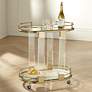 Adaline 29 1/2" Wide Clear Acrylic and Gold Oval Bar Cart in scene