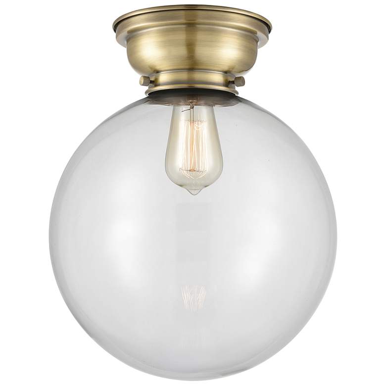 Image 1 Aditi Beacon 12" Wide Antique Brass Flush Mount With Clear Shade