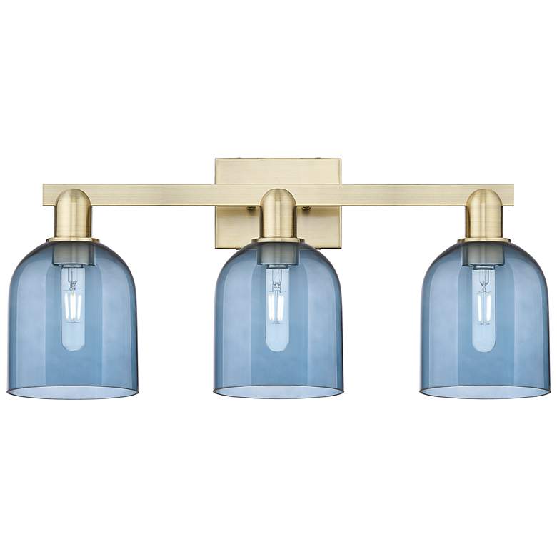 Image 1 Arcadia Bella 25"W 3 Light Antique Brass Vanity Light With Blue Shade