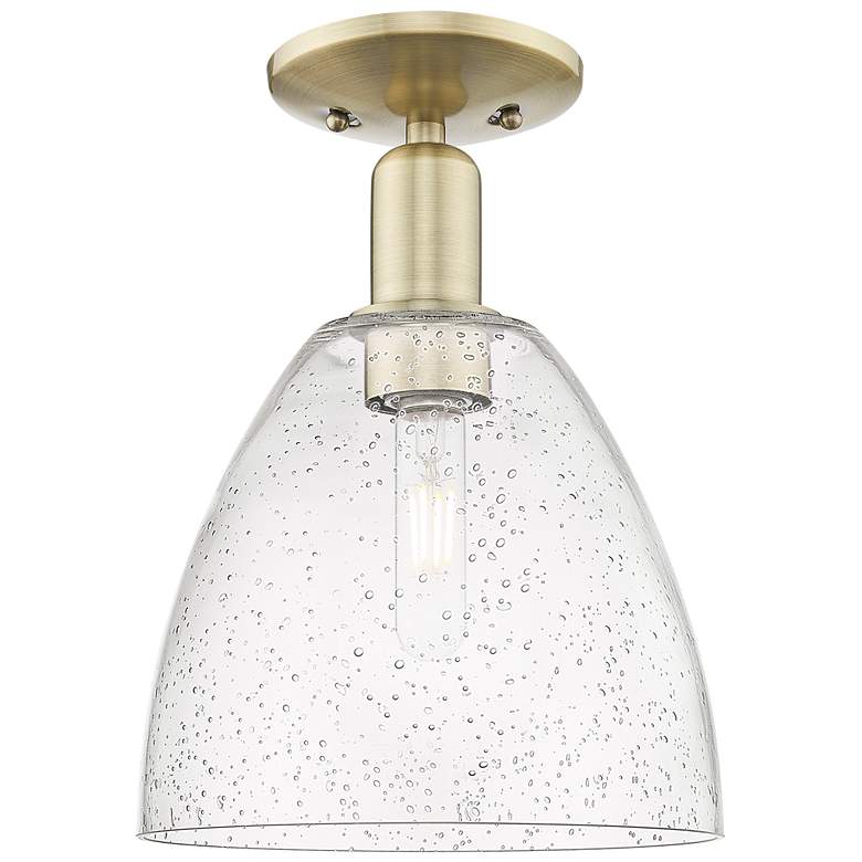 Image 1 Arcadia Bristol 9"W Antique Brass Semi.Flush Mount With Seedy Shade
