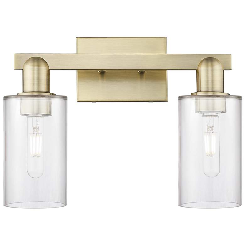 Image 1 Arcadia Clymer 15"W 2 Light Antique Brass Bath Light With Clear Shade
