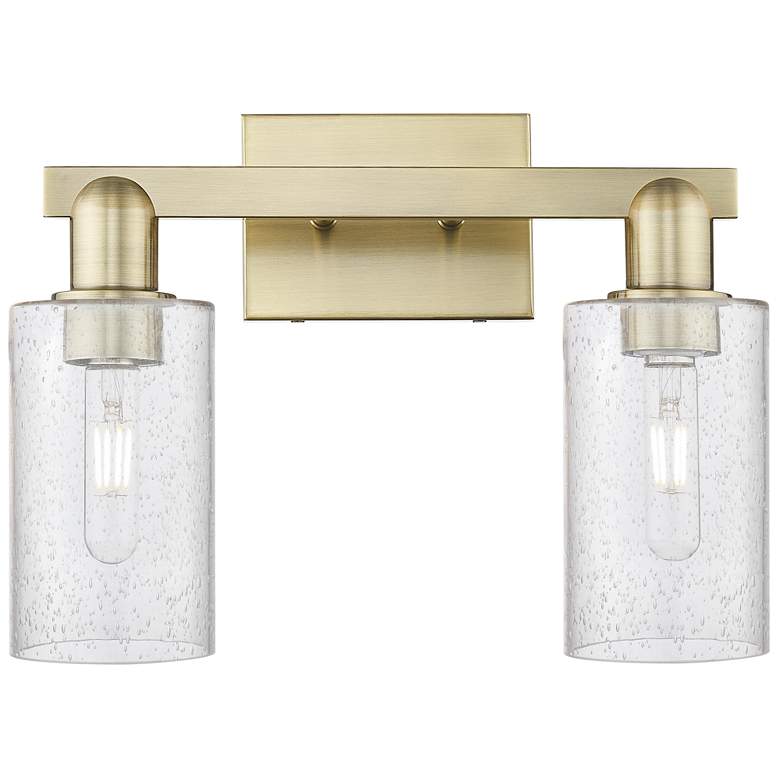 Image 1 Arcadia Clymer 15"W 2 Light Antique Brass Bath Light With Seedy Shade