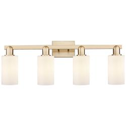 Arcadia Clymer 31"W 4 Light Bronze Vanity Light w/ Matte White Shade