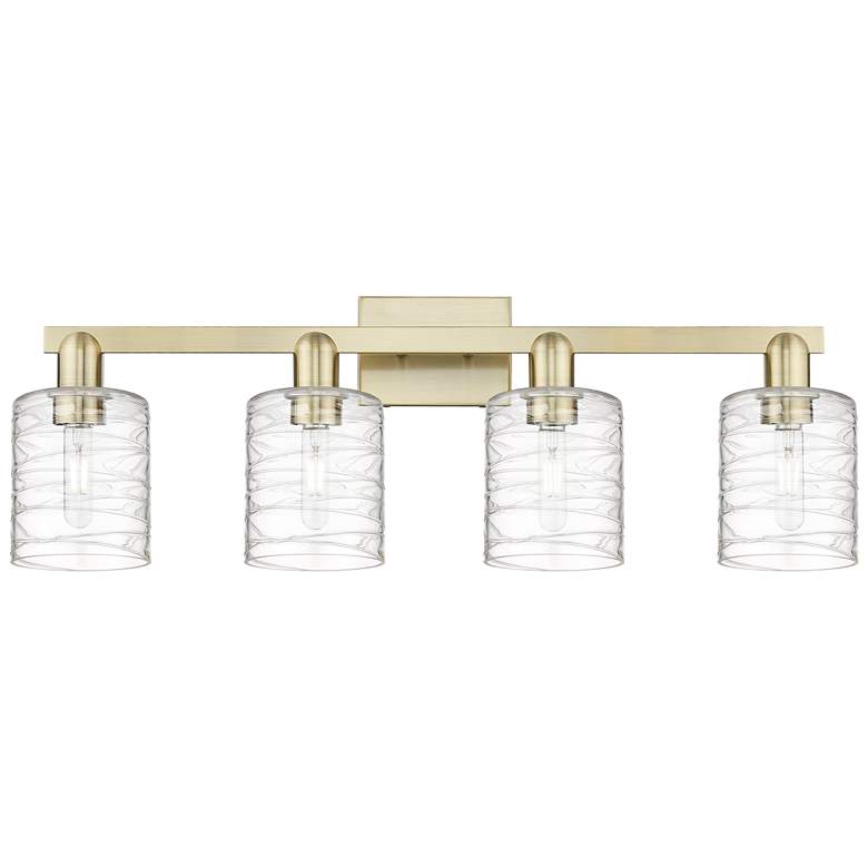 Image 1 Arcadia Cobbleskill 32"W 4 Light Brass Bath Light w/ Deco Swirl Shade