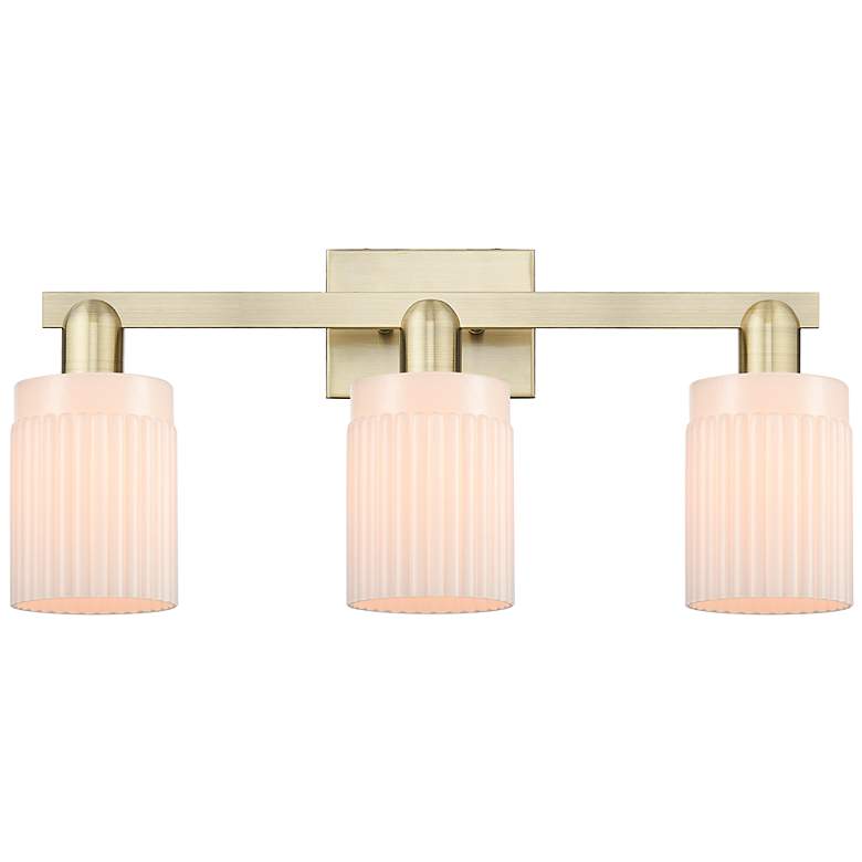 Image 1 Arcadia Hadley 24"W 3 Light Brass Vanity Light With Matte White Shade