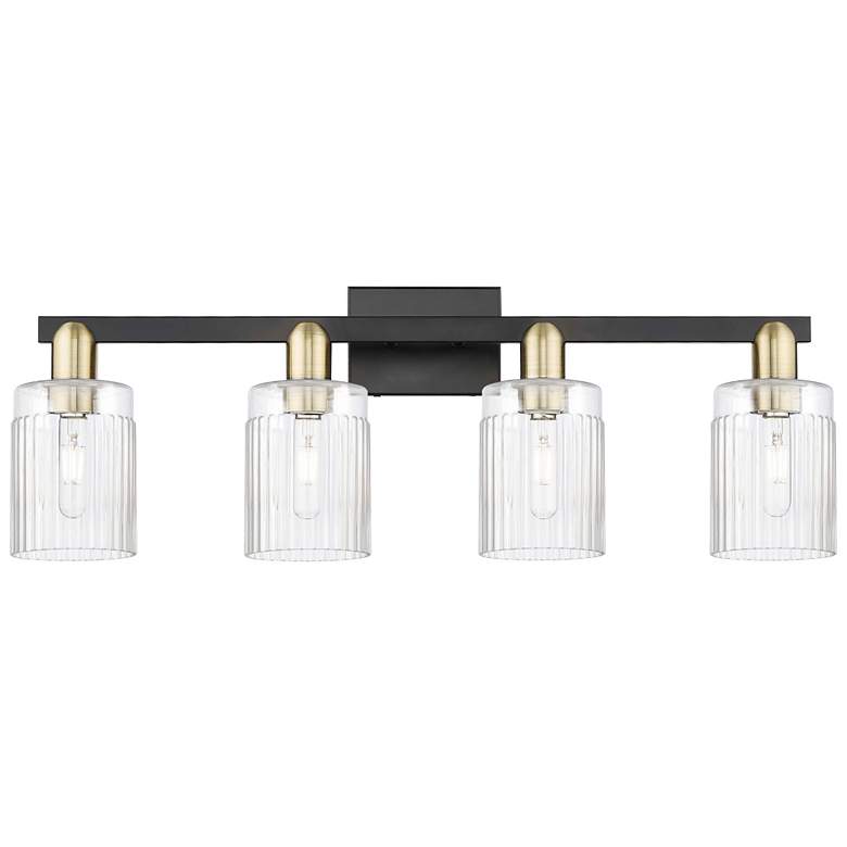 Image 1 Arcadia Hadley 32"W 4 Light Black And Brass Bath Light w/ Clear Shade