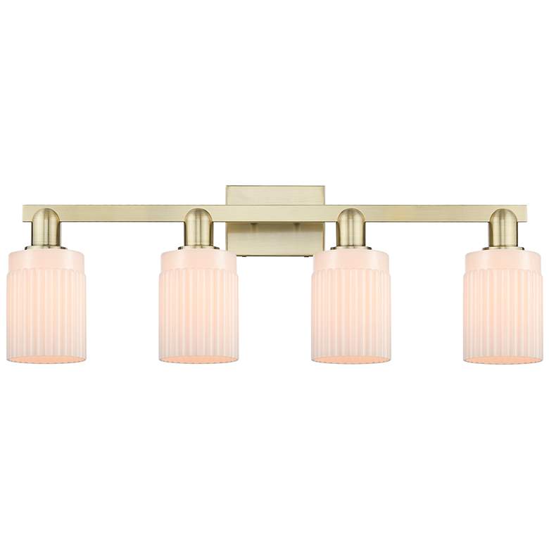 Image 1 Arcadia Hadley 32"W 4 Light Brass Vanity Light With Matte White Shade
