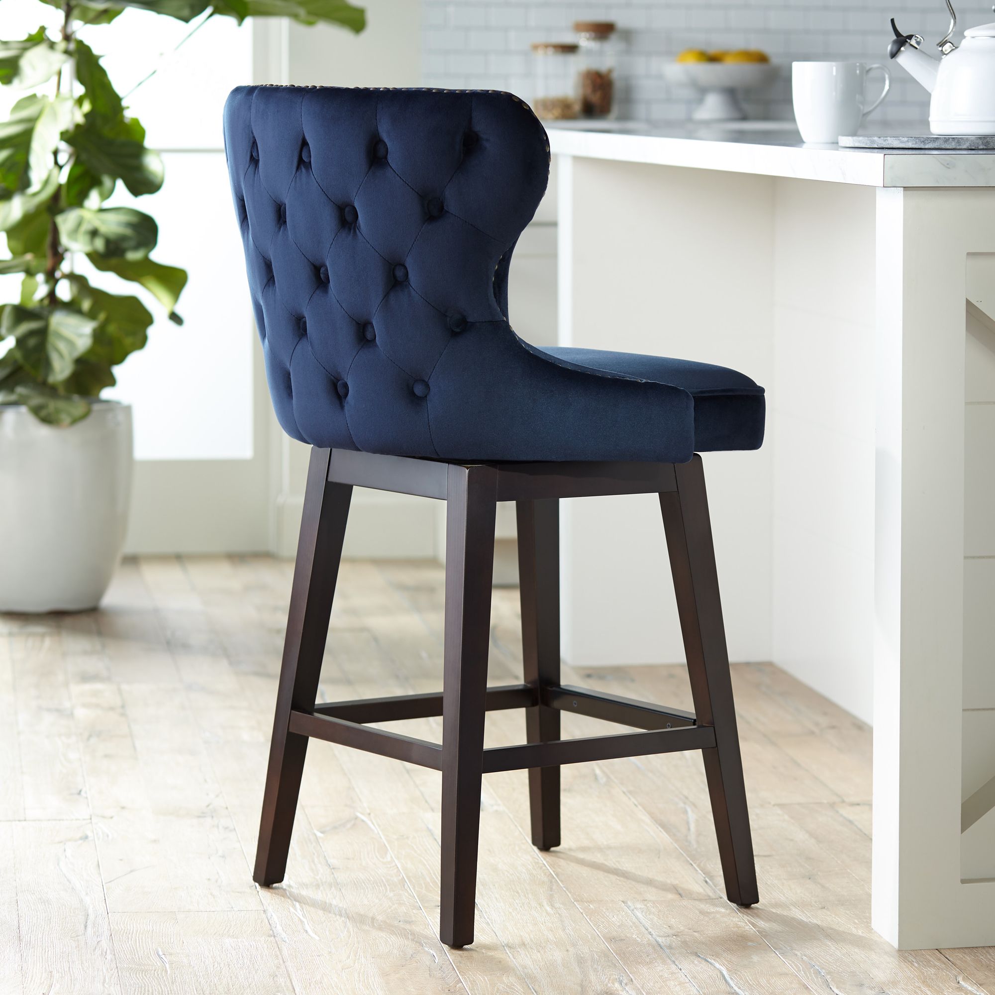 blue and brass bar stools