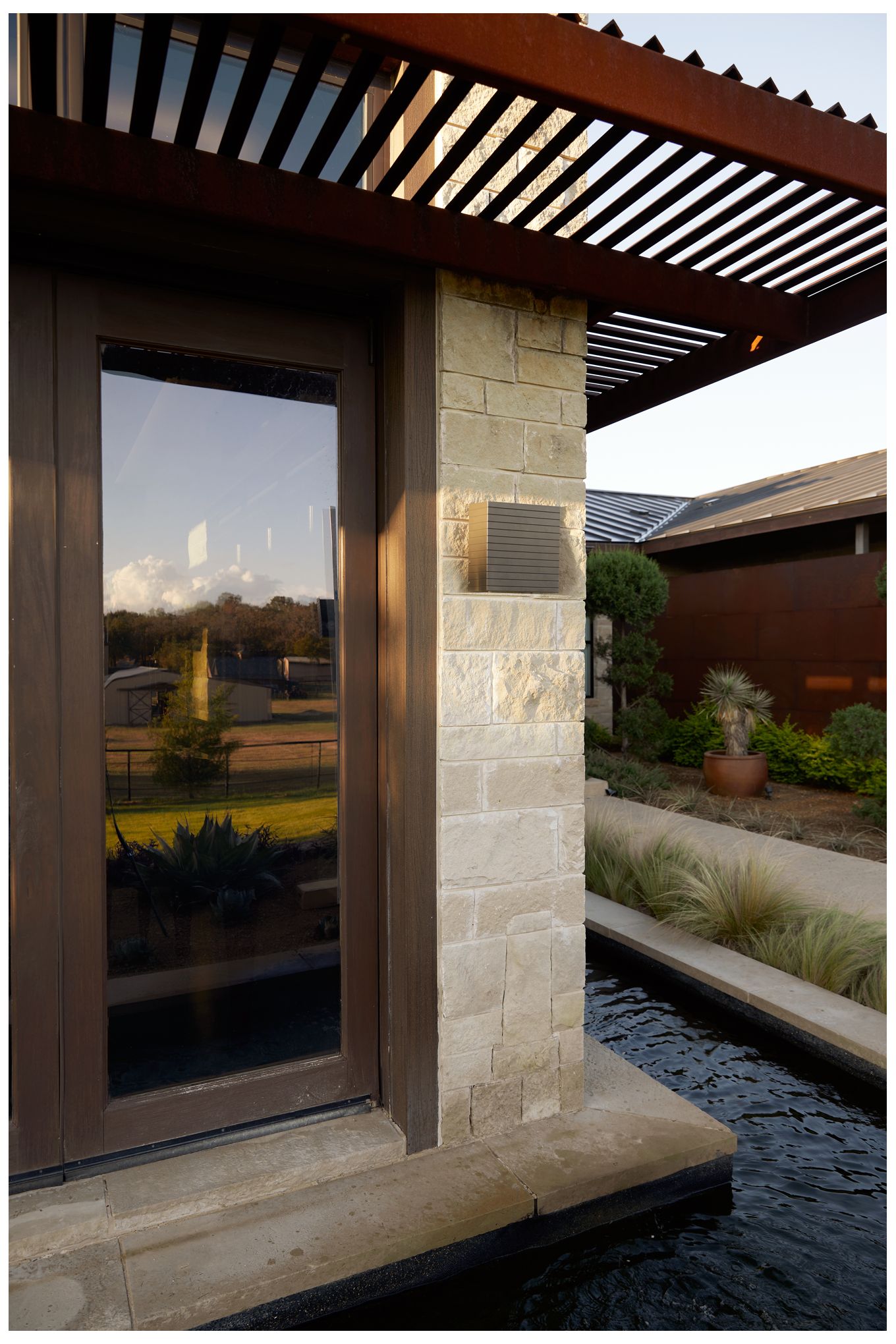 Arteriors Carter Outdoor Sconce Aged Iron