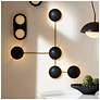 1_Arteriors Glaze Sculptural Matte Black Ceramic Sconce 44" Antique Brass