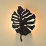 Aruba 16 3/4" High Natural Black Metal Wall Sconce in scene