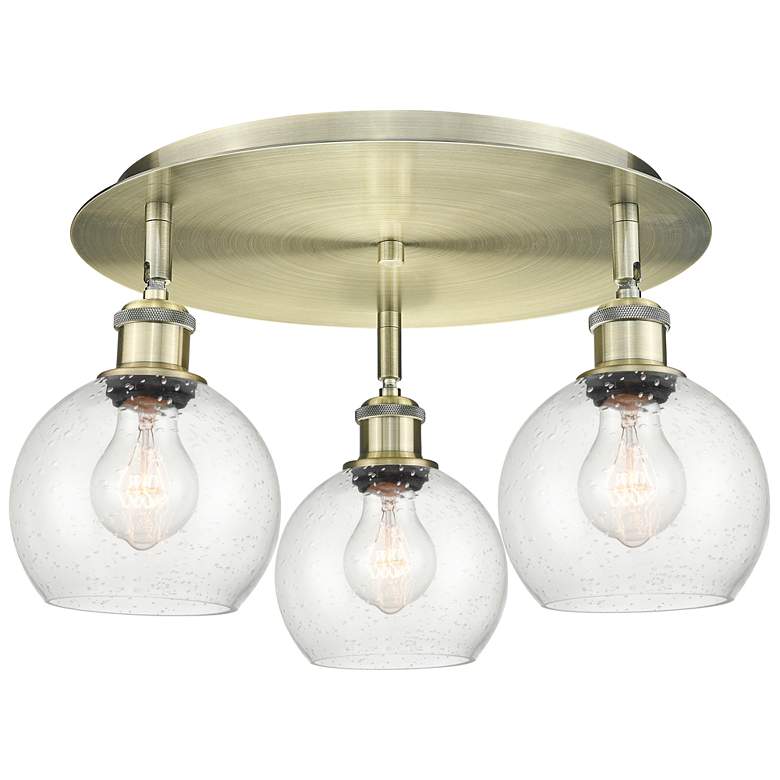 Image 1 Athens 17.75" Wide 3 Light Antique Brass Flush Mount With Seedy Glass
