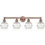 Athens 33"W 4 Light Antique Copper Bath Light With Clear Deco Swirl Sh