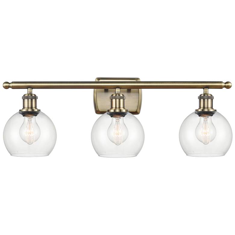 Image 1 Athens 6" 3 Light 26" LED Bath Light - Antique Brass - Clear Shad
