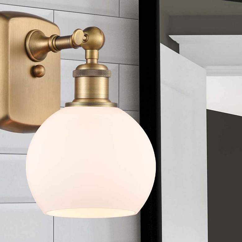 Image 1 Athens 9 1/2" High Brushed Brass Wall Sconce w/ White Glass